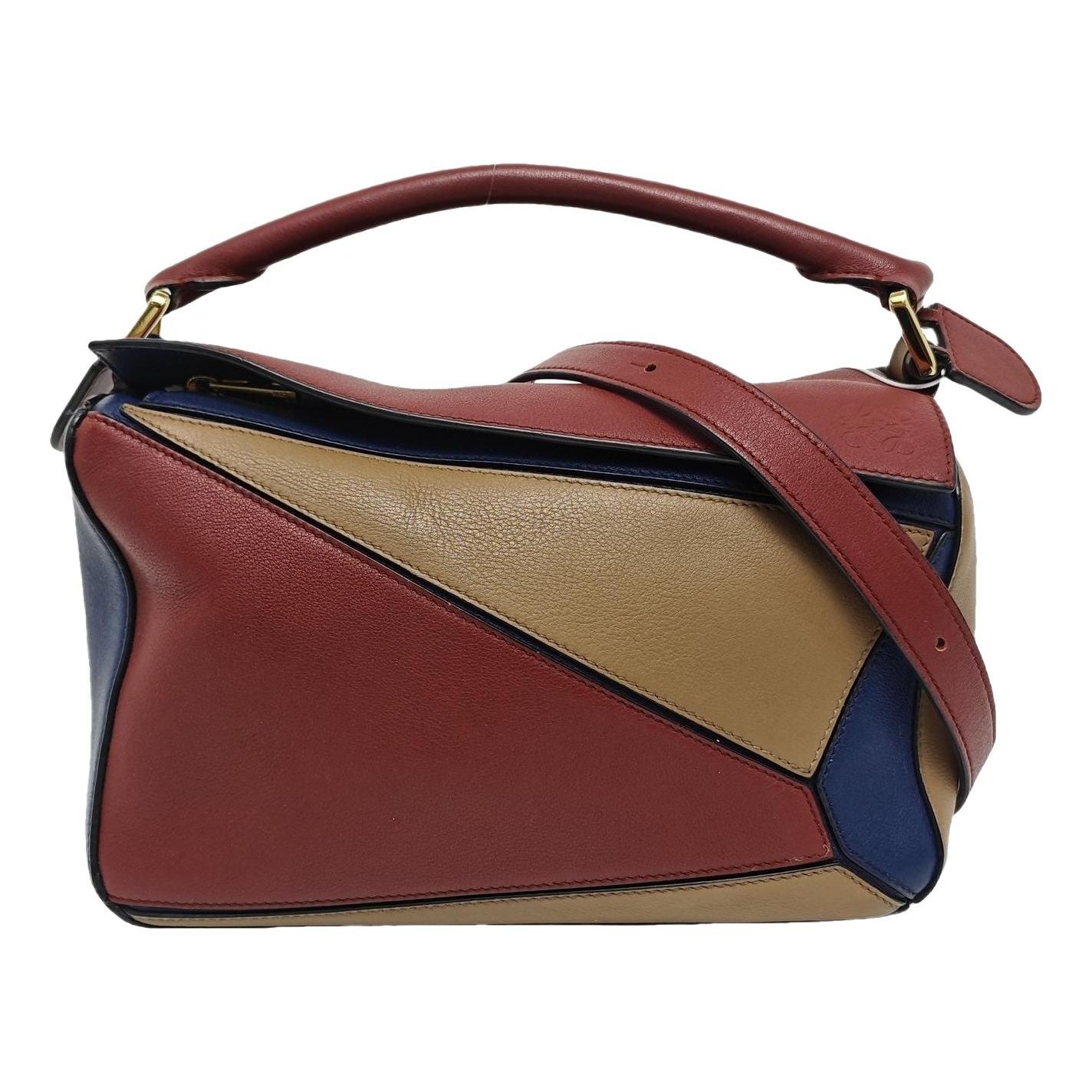 Puzzle leather handbag