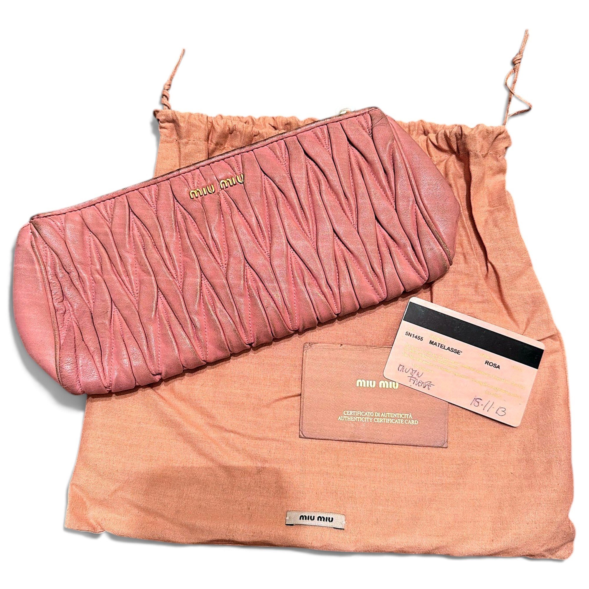 Matelassé leather clutch bag
