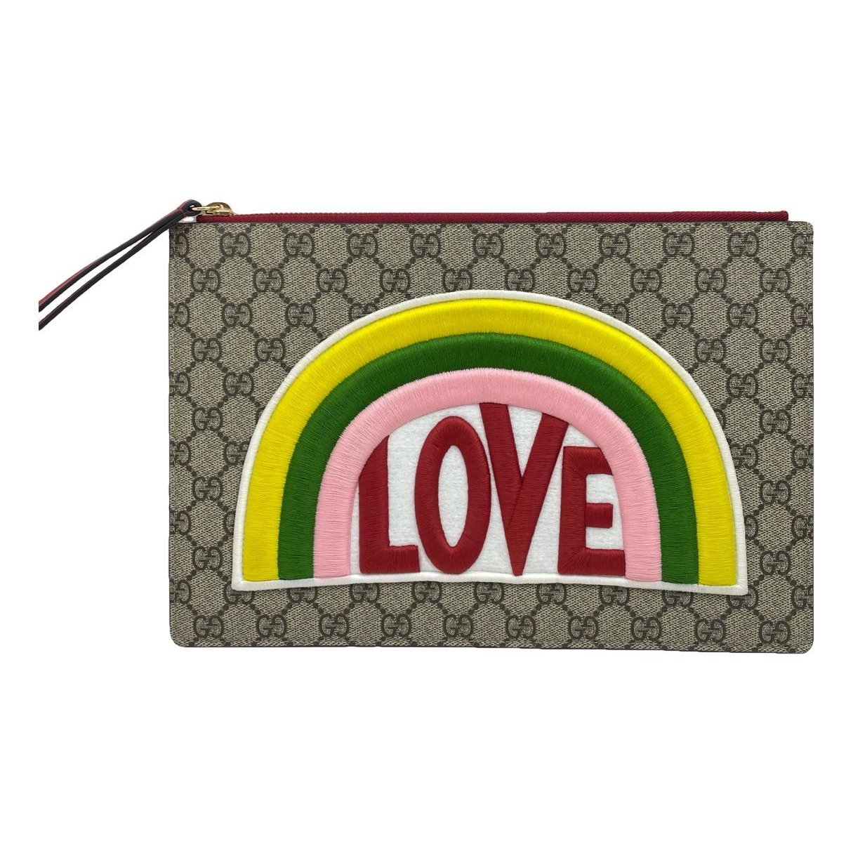 Ophidia cloth clutch bag