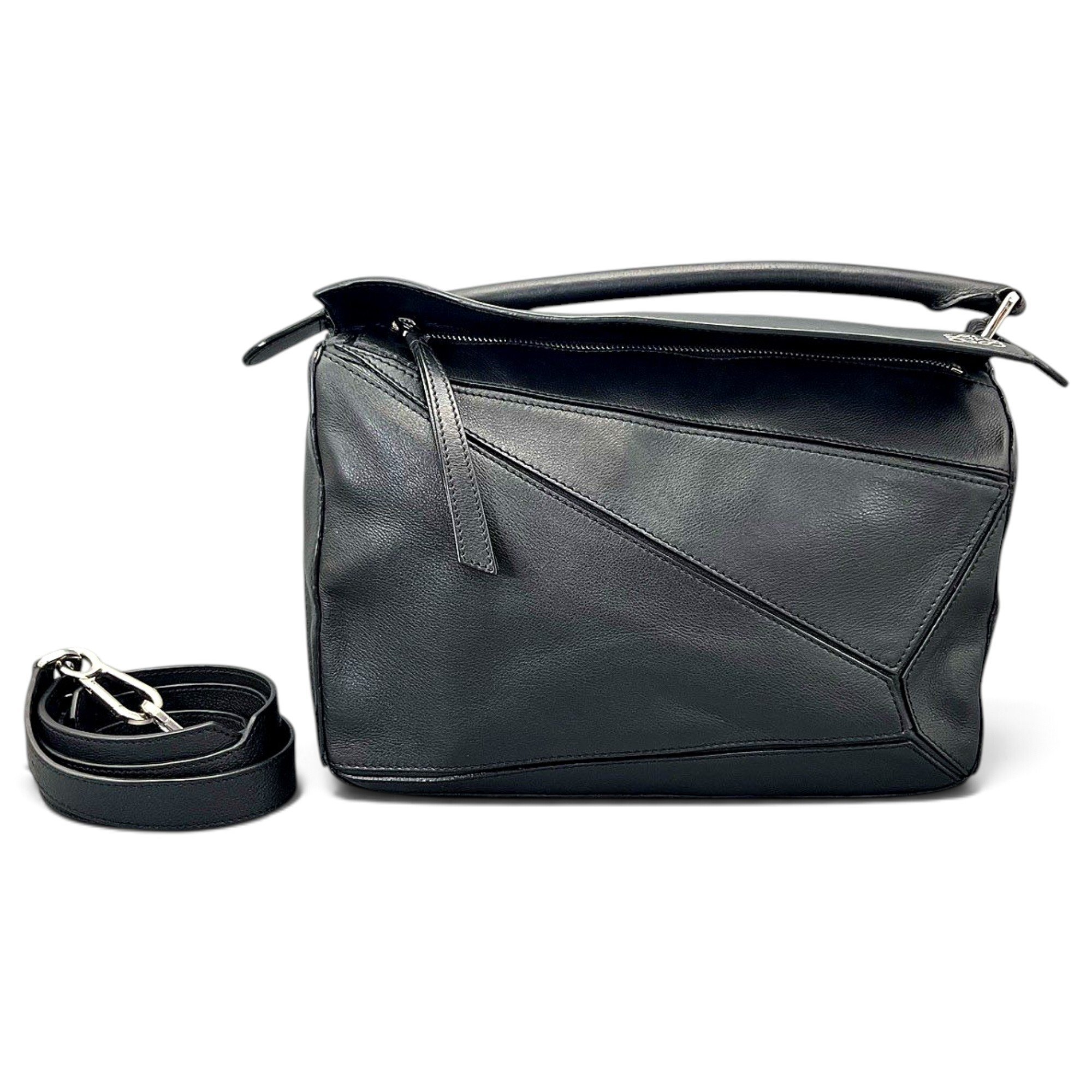 Puzzle leather handbag
