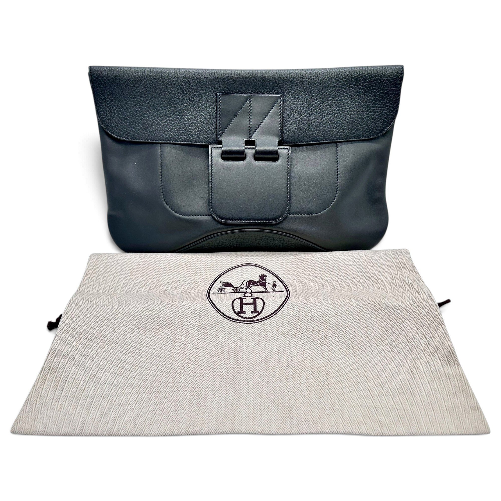 Verrou leather clutch bag