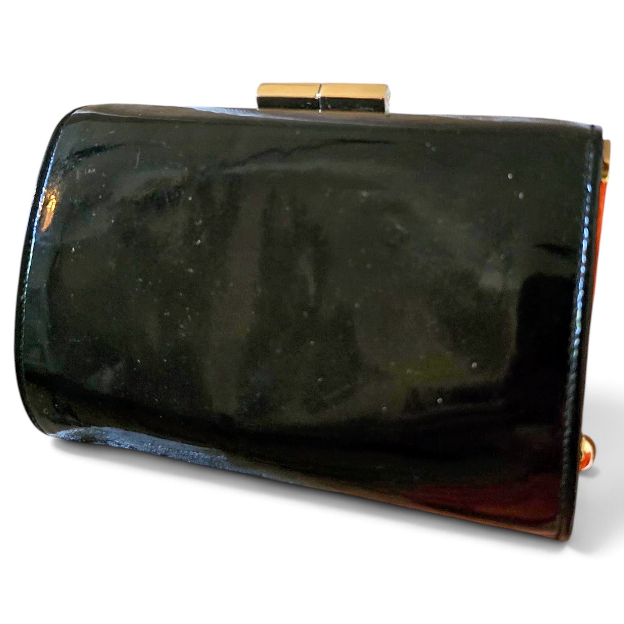 Celeste patent leather clutch bag