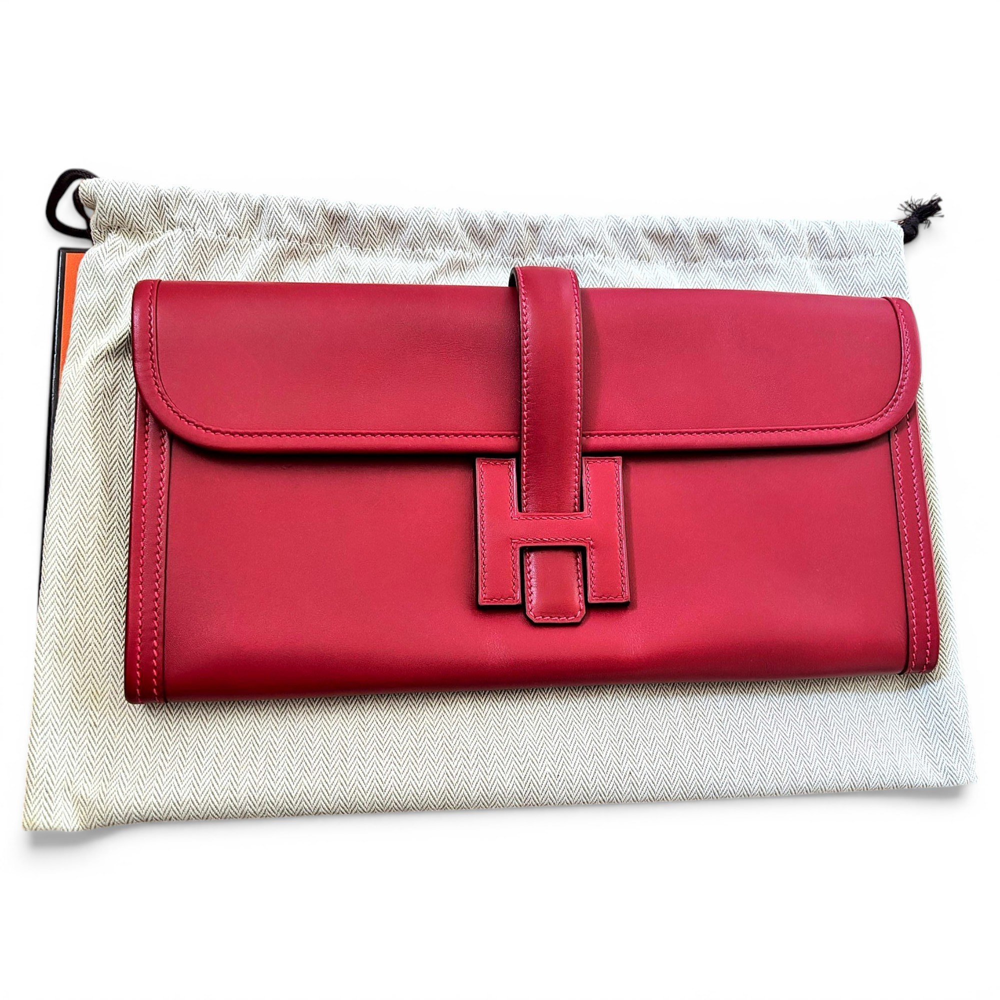 Jige leather clutch bag