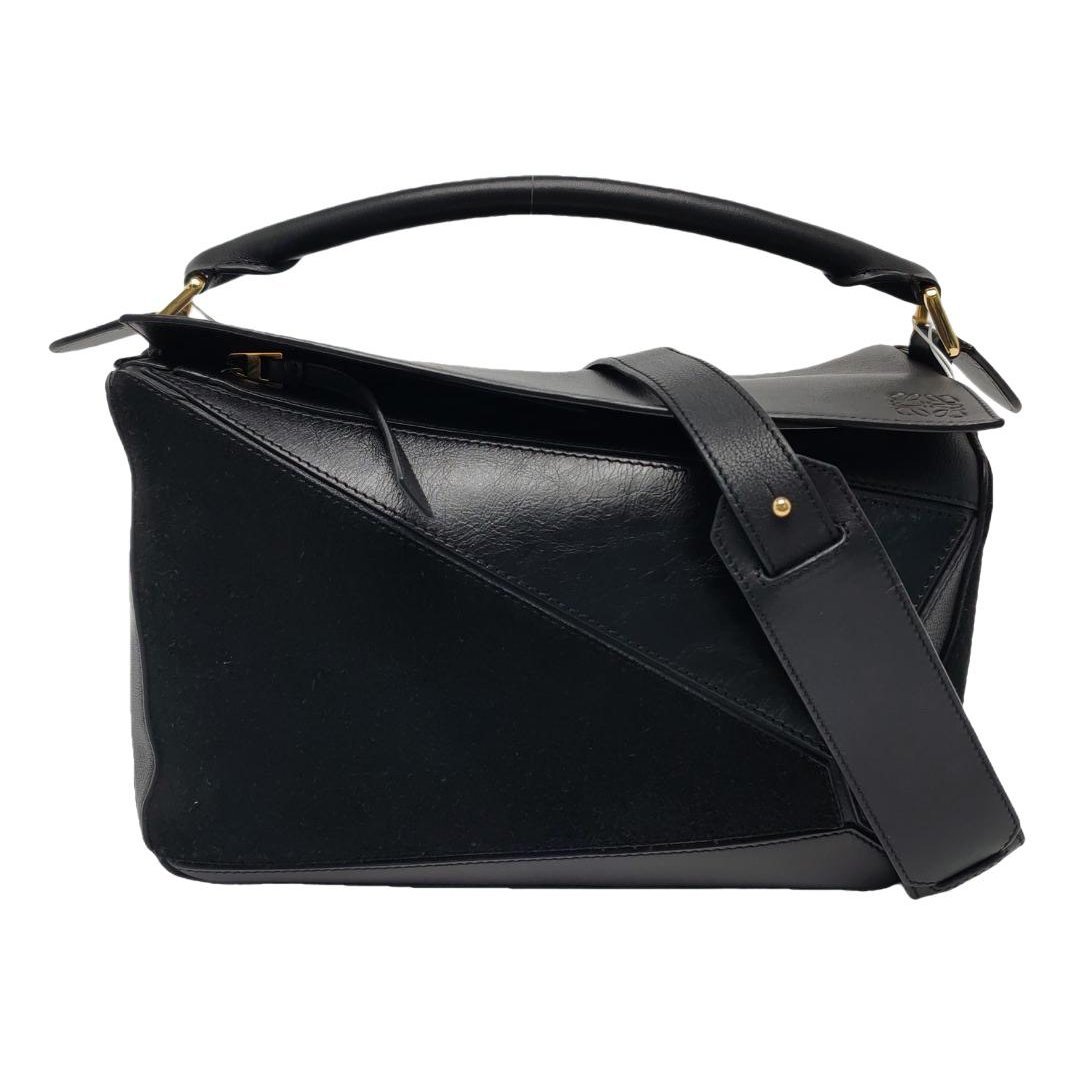Puzzle leather handbag