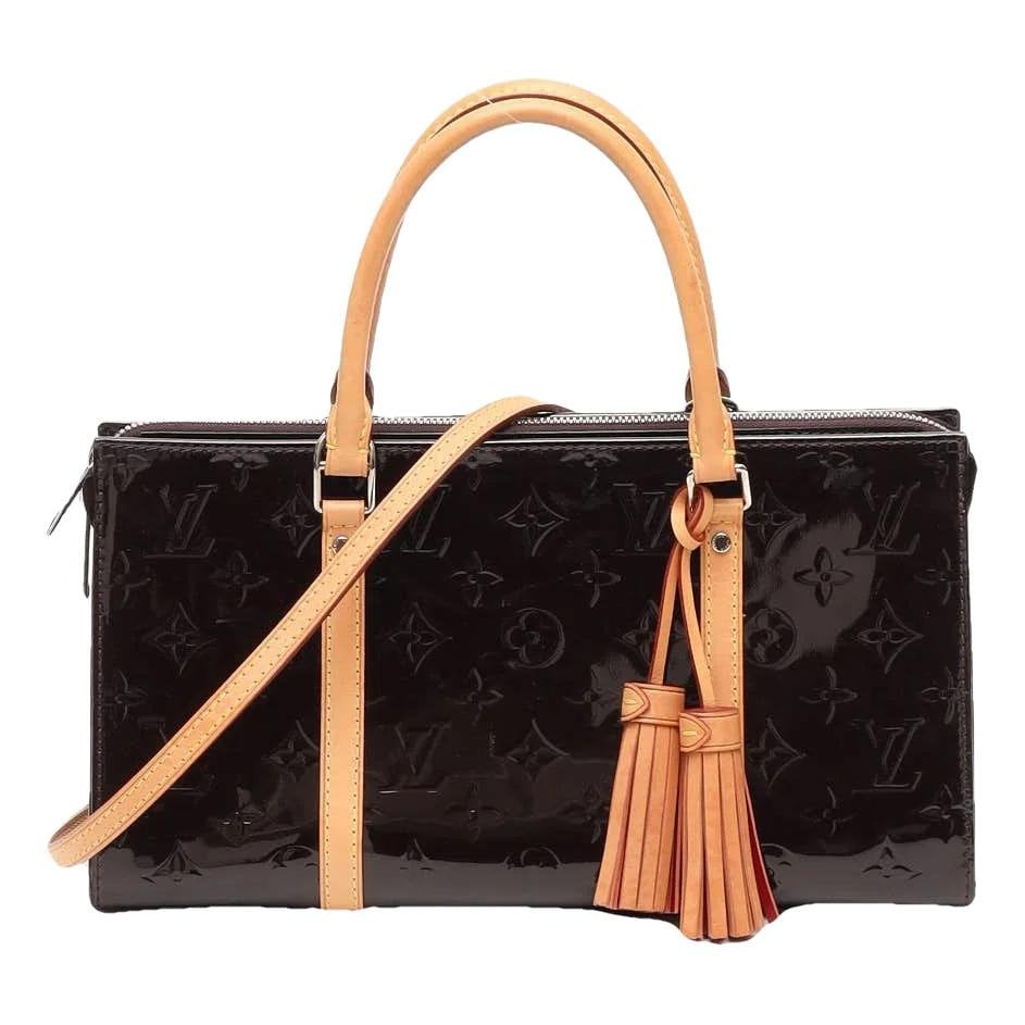 Neo Triangle patent leather handbag