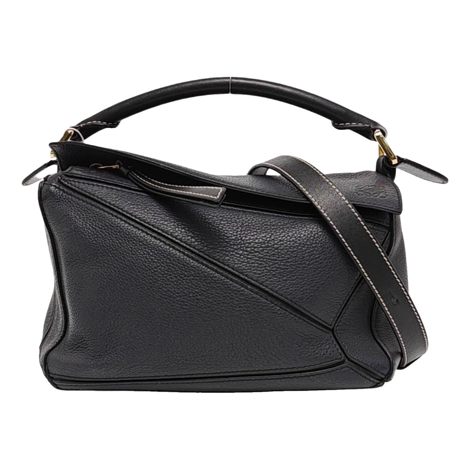 Puzzle leather crossbody bag