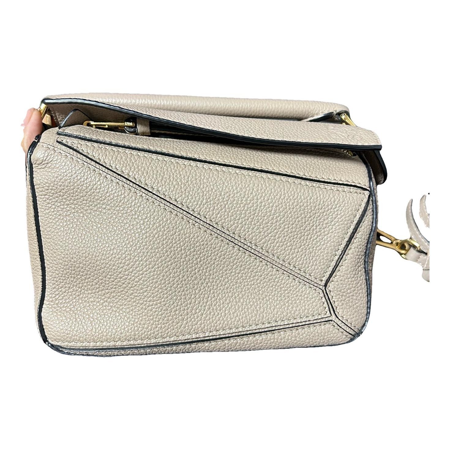 Puzzle leather handbag