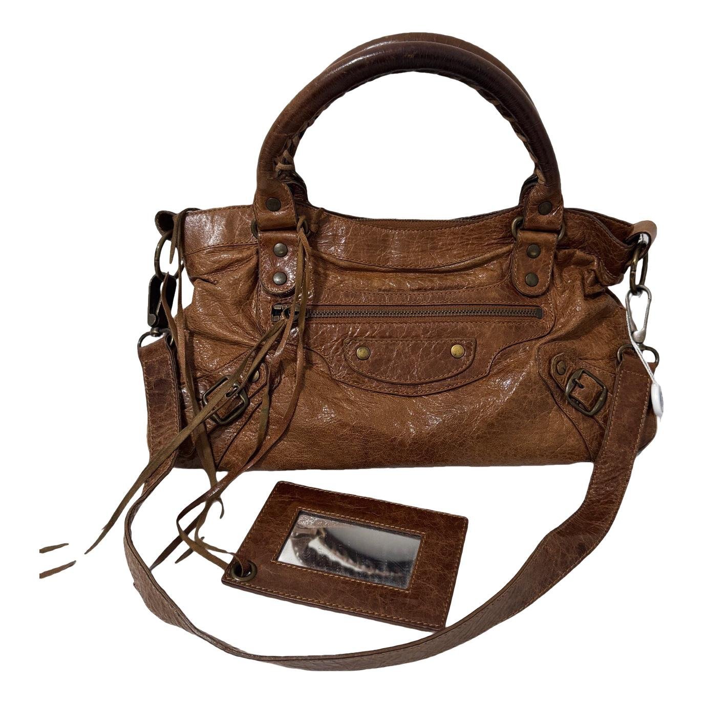 First leather handbag