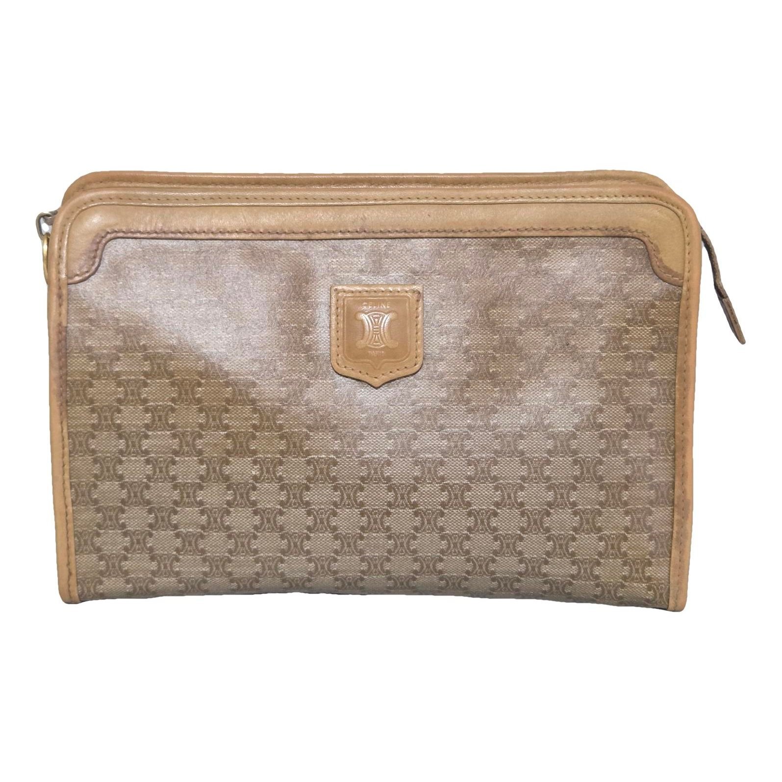 Triomphe Vintage leather clutch bag