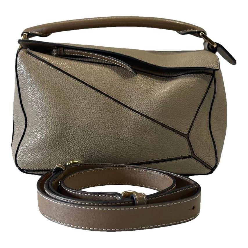 Puzzle leather handbag