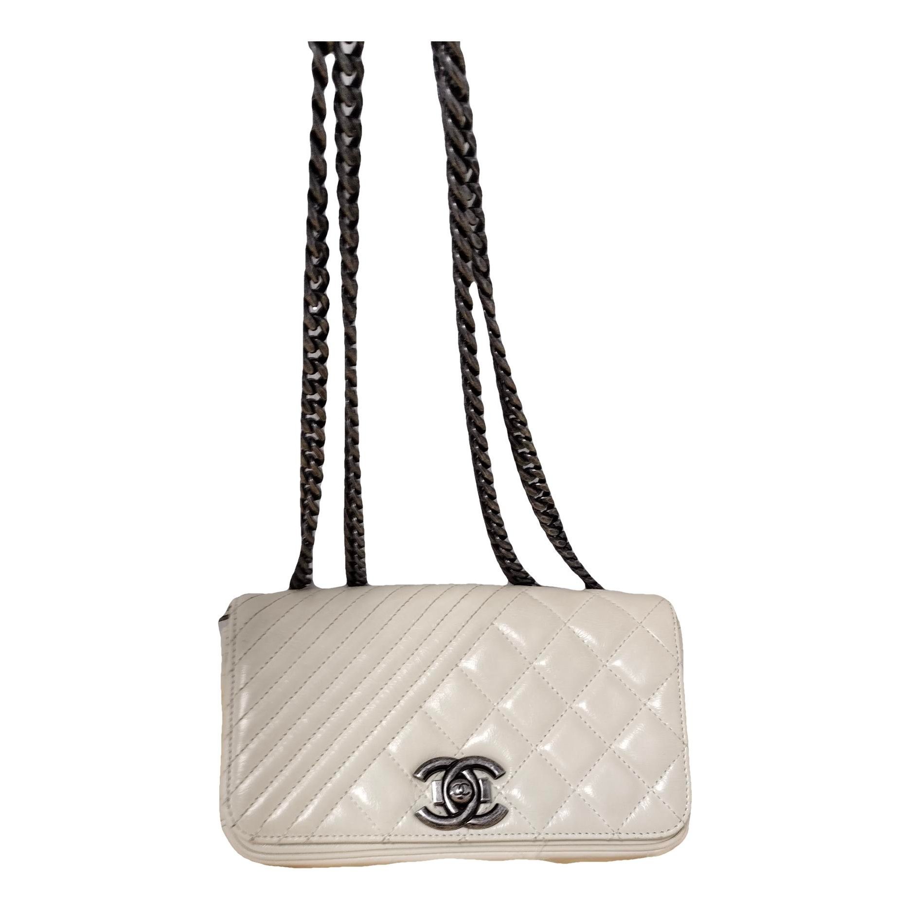 Wallet On Chain Boy Half Flap leather crossbody bag