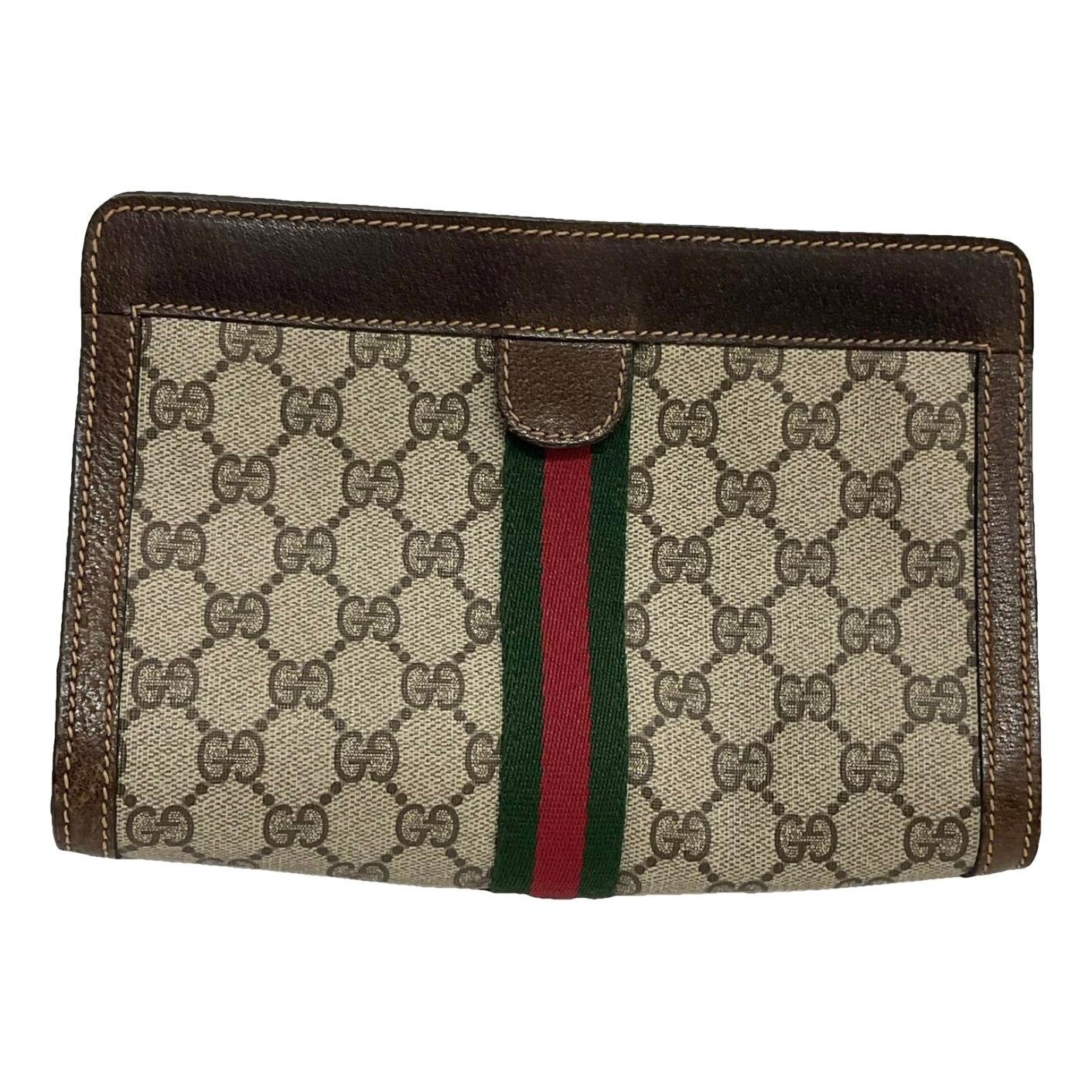 Ophidia cloth clutch bag