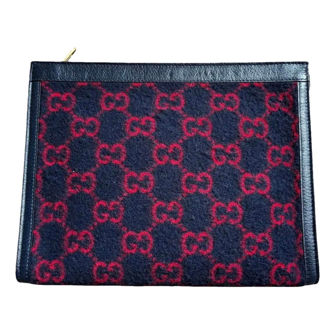Ophidia wool clutch bag