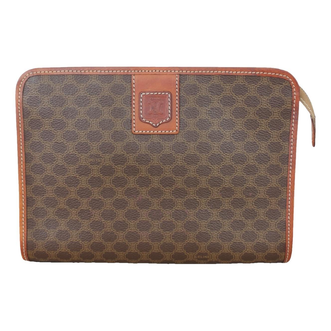 Triomphe Vintage cloth clutch bag