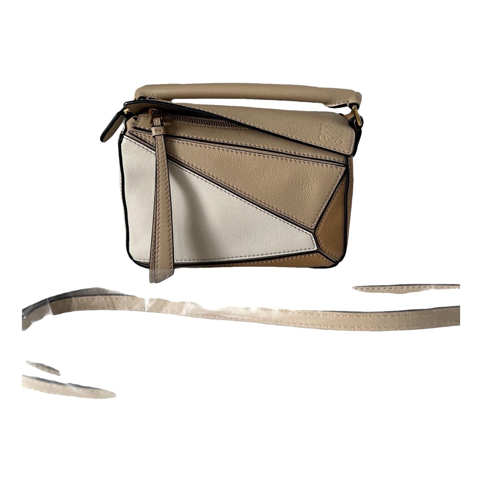 Puzzle leather mini bag