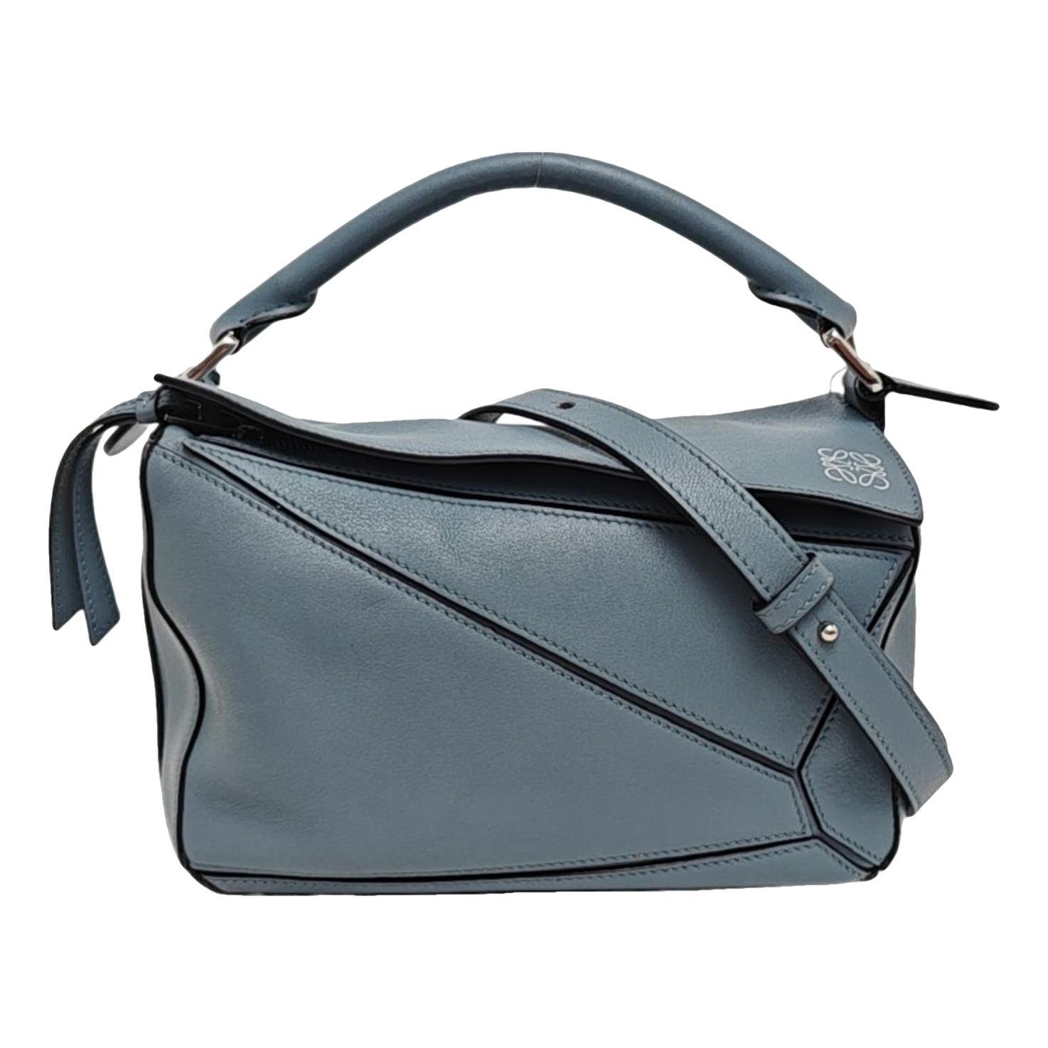 Puzzle leather handbag