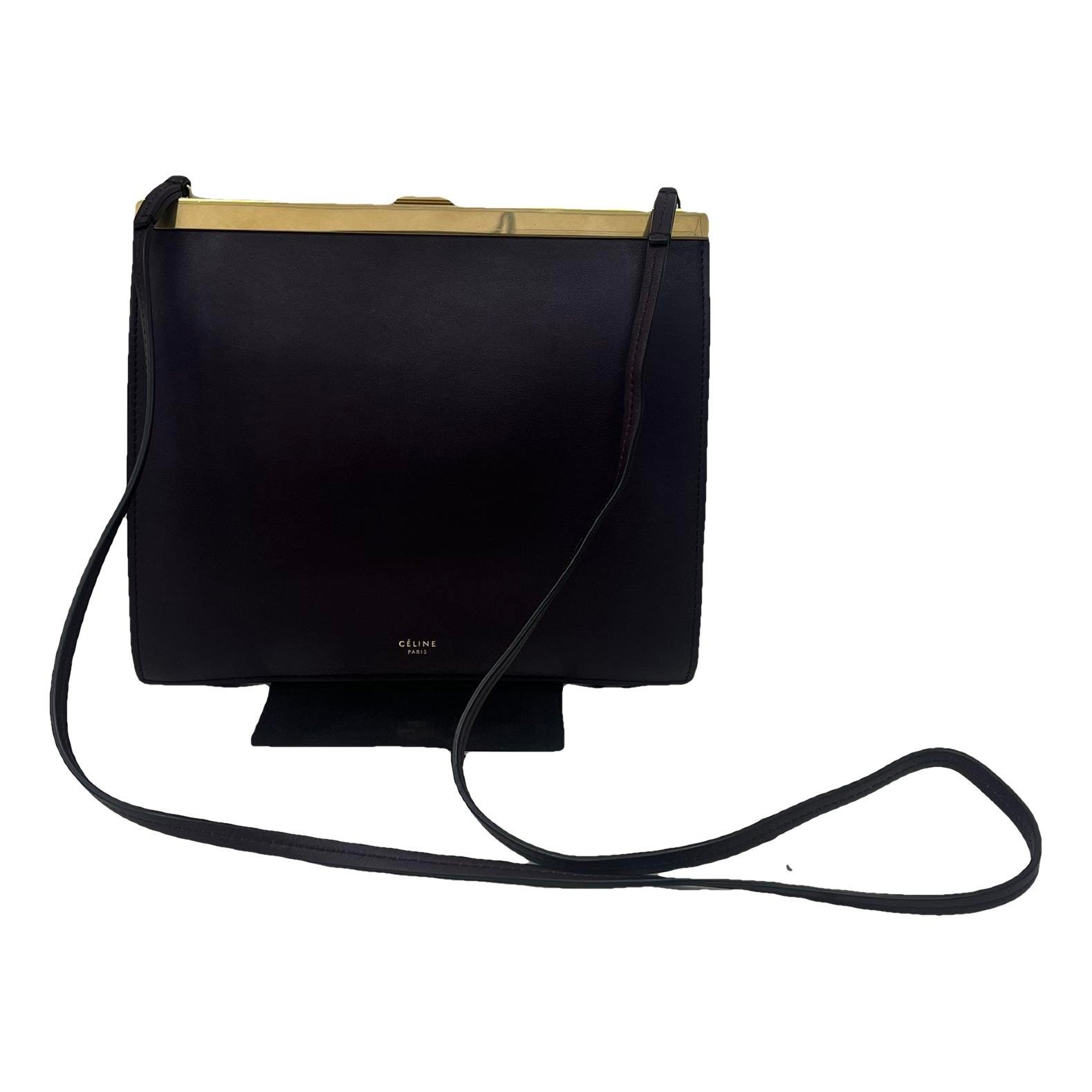 Clasp leather handbag