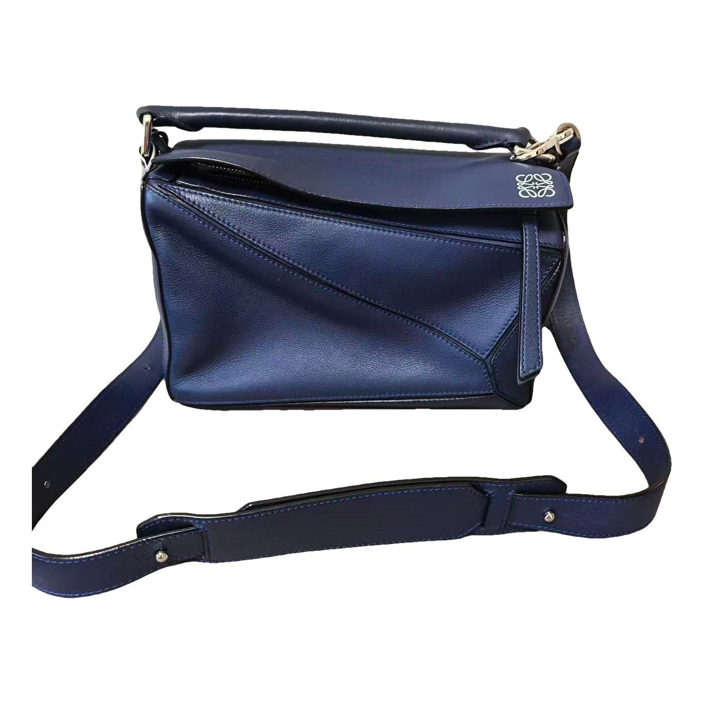 Puzzle leather handbag