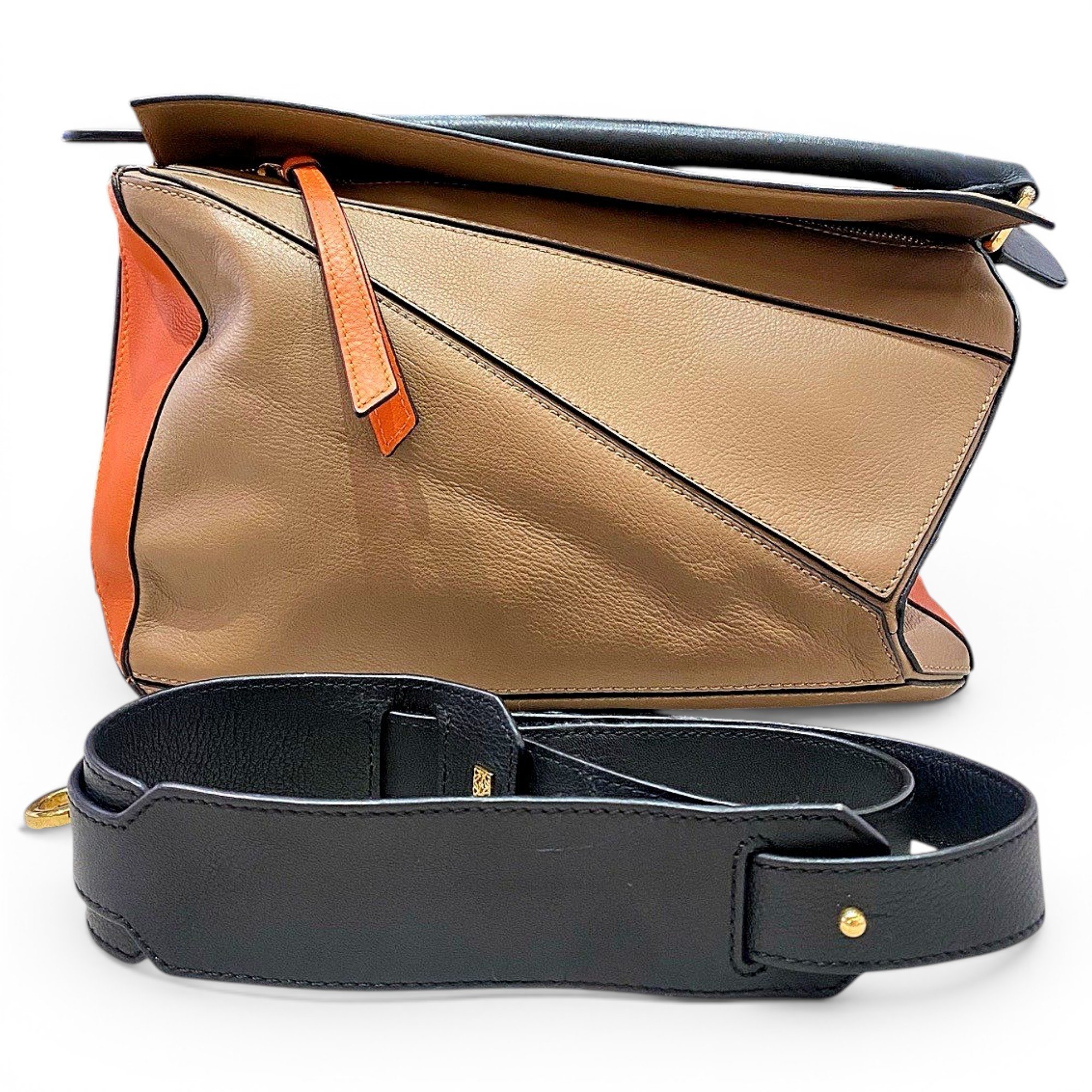 Puzzle leather handbag