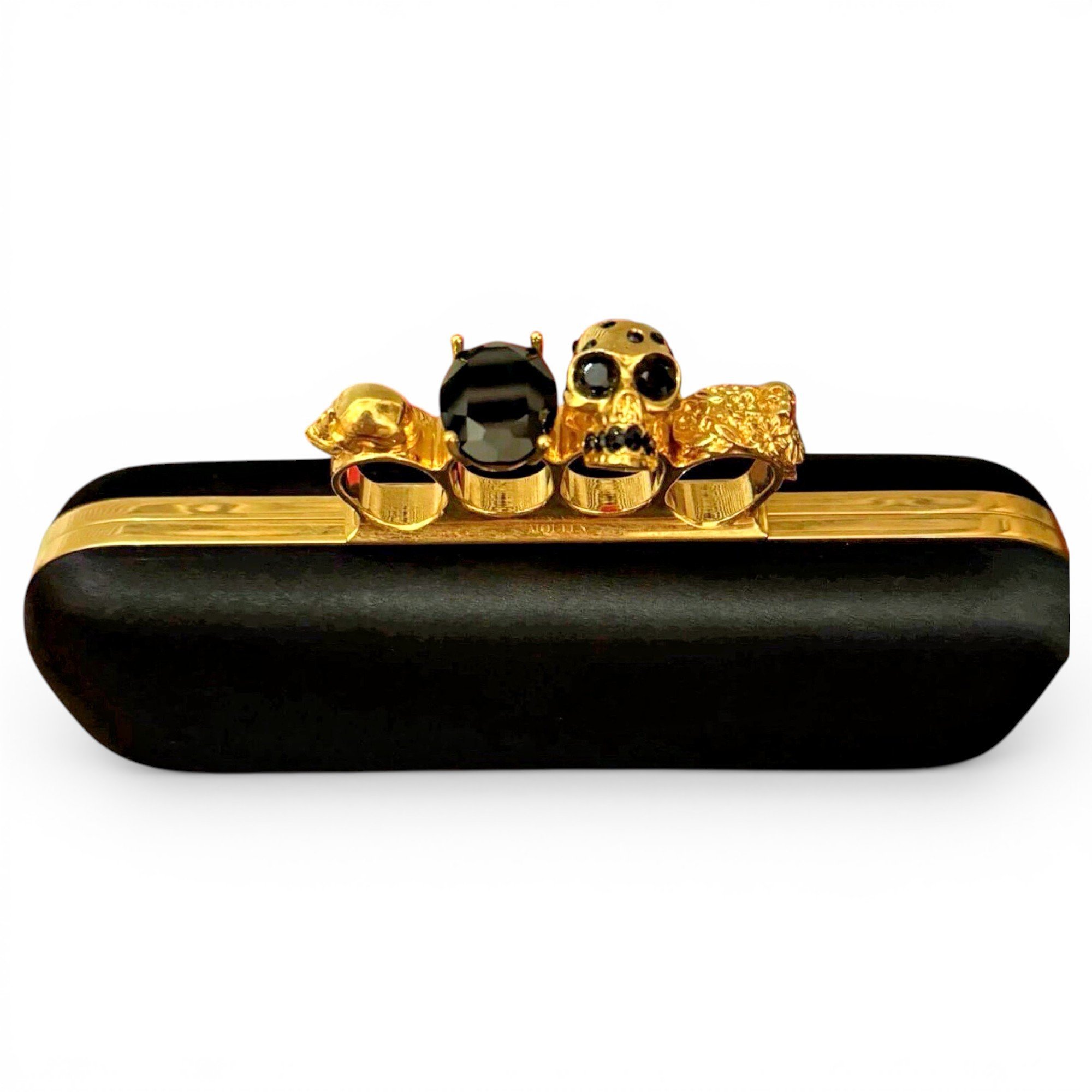 Knuckle leather clutch bag
