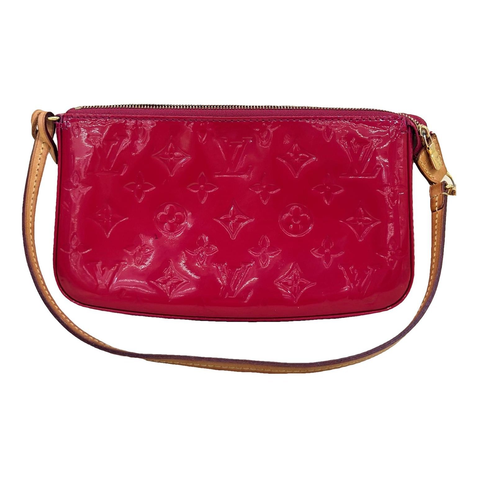 Pochette Accessoire patent leather handbag