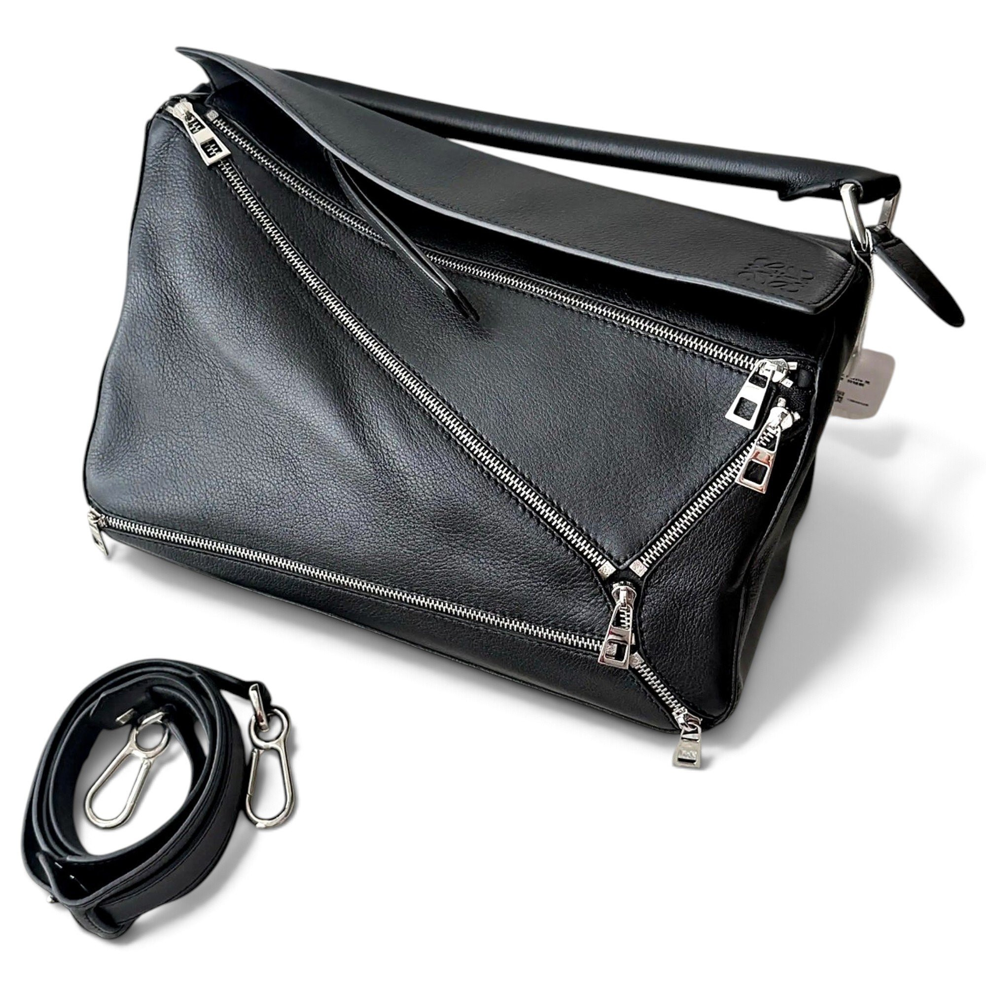 Puzzle leather handbag