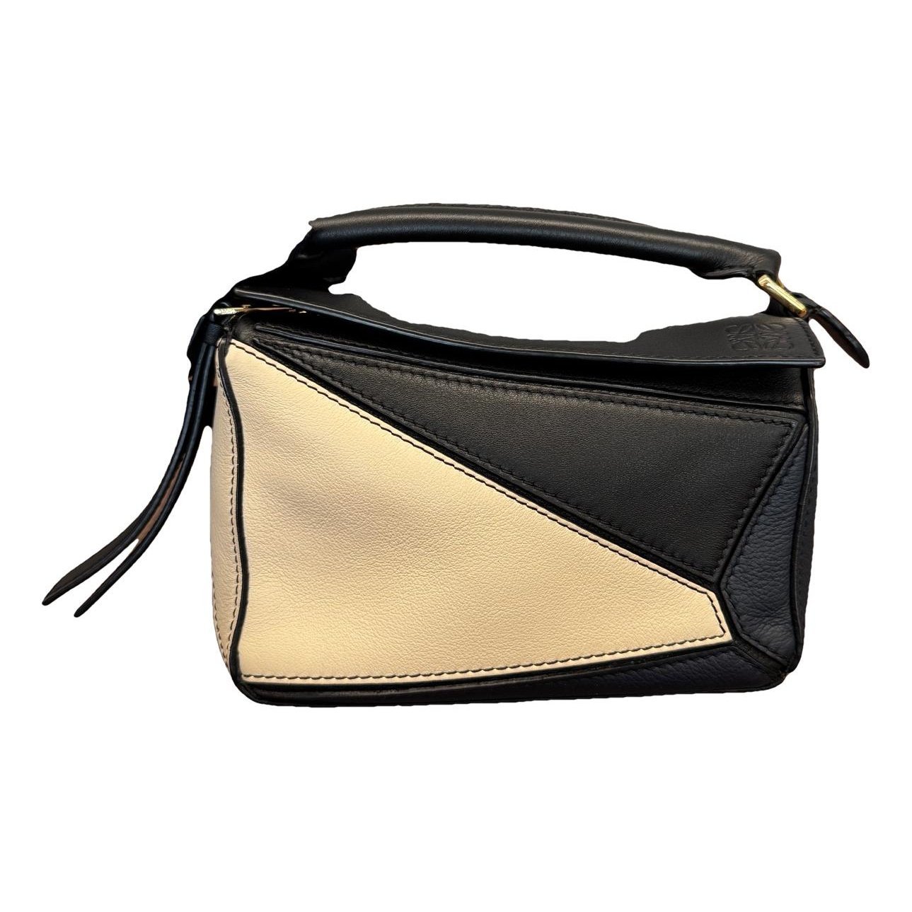 Puzzle leather handbag
