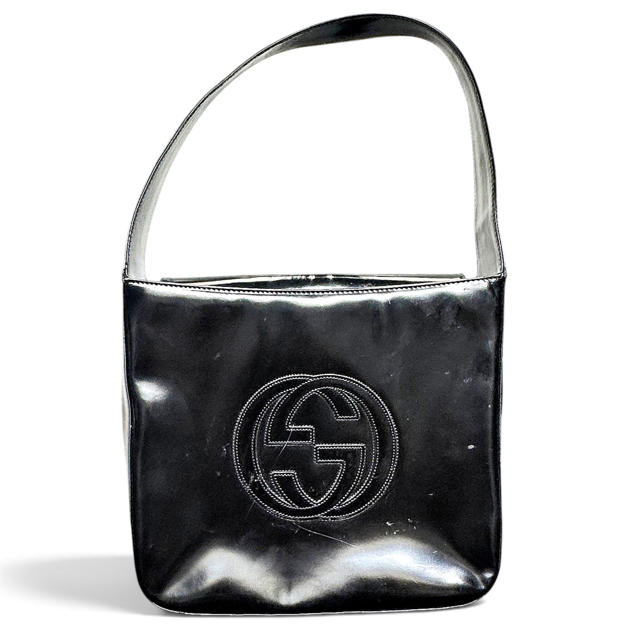 Interlocking patent leather handbag