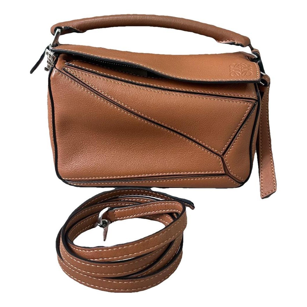 Puzzle leather handbag