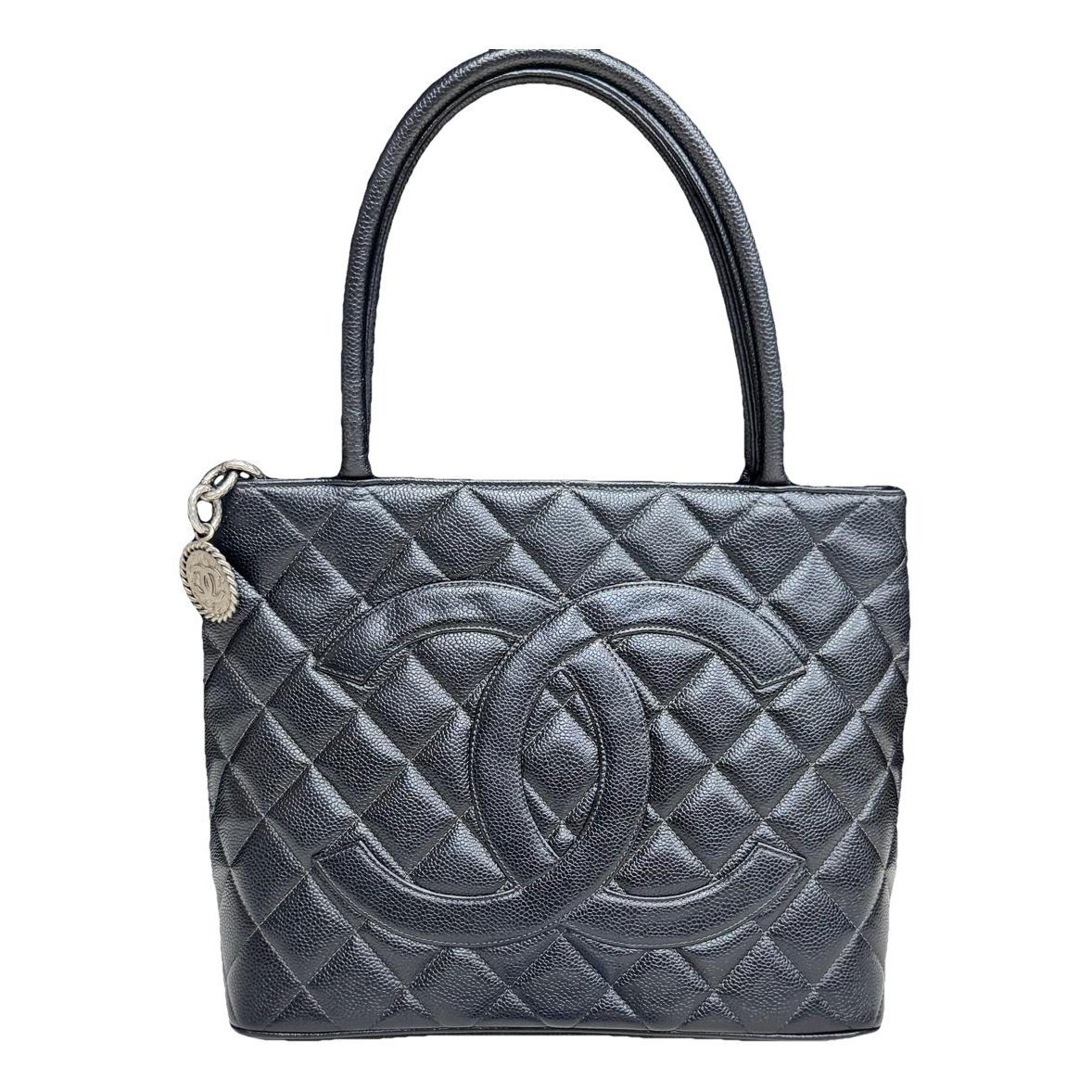 Médaillon leather handbag