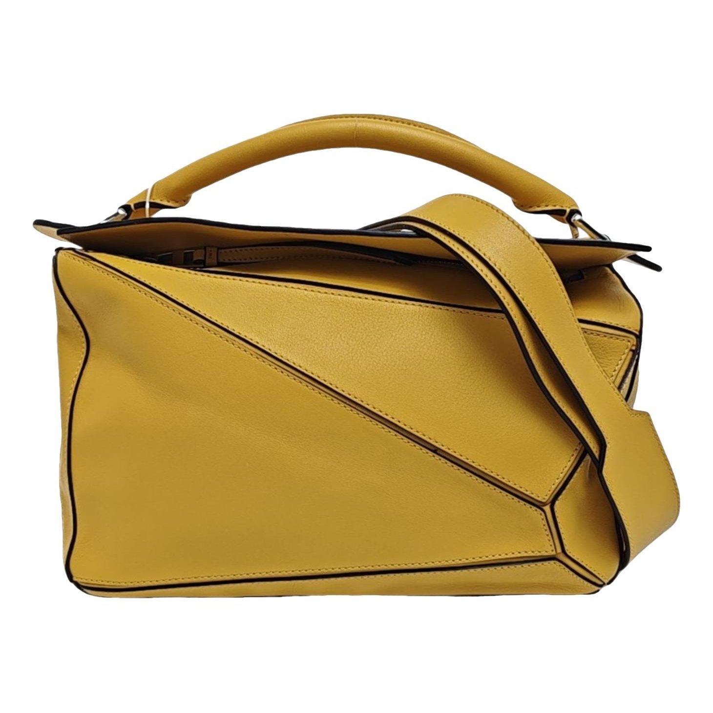 Puzzle leather handbag