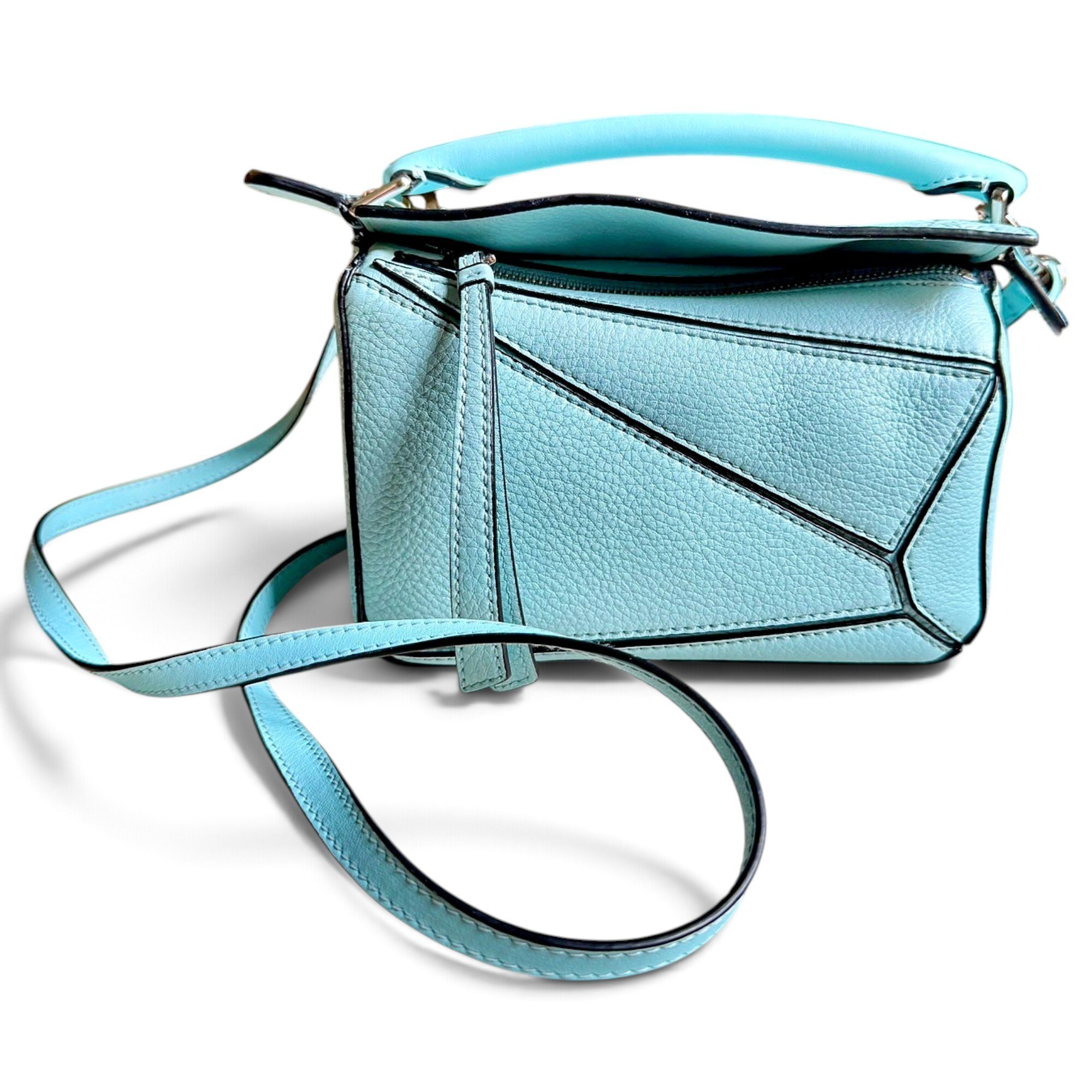 Puzzle leather handbag