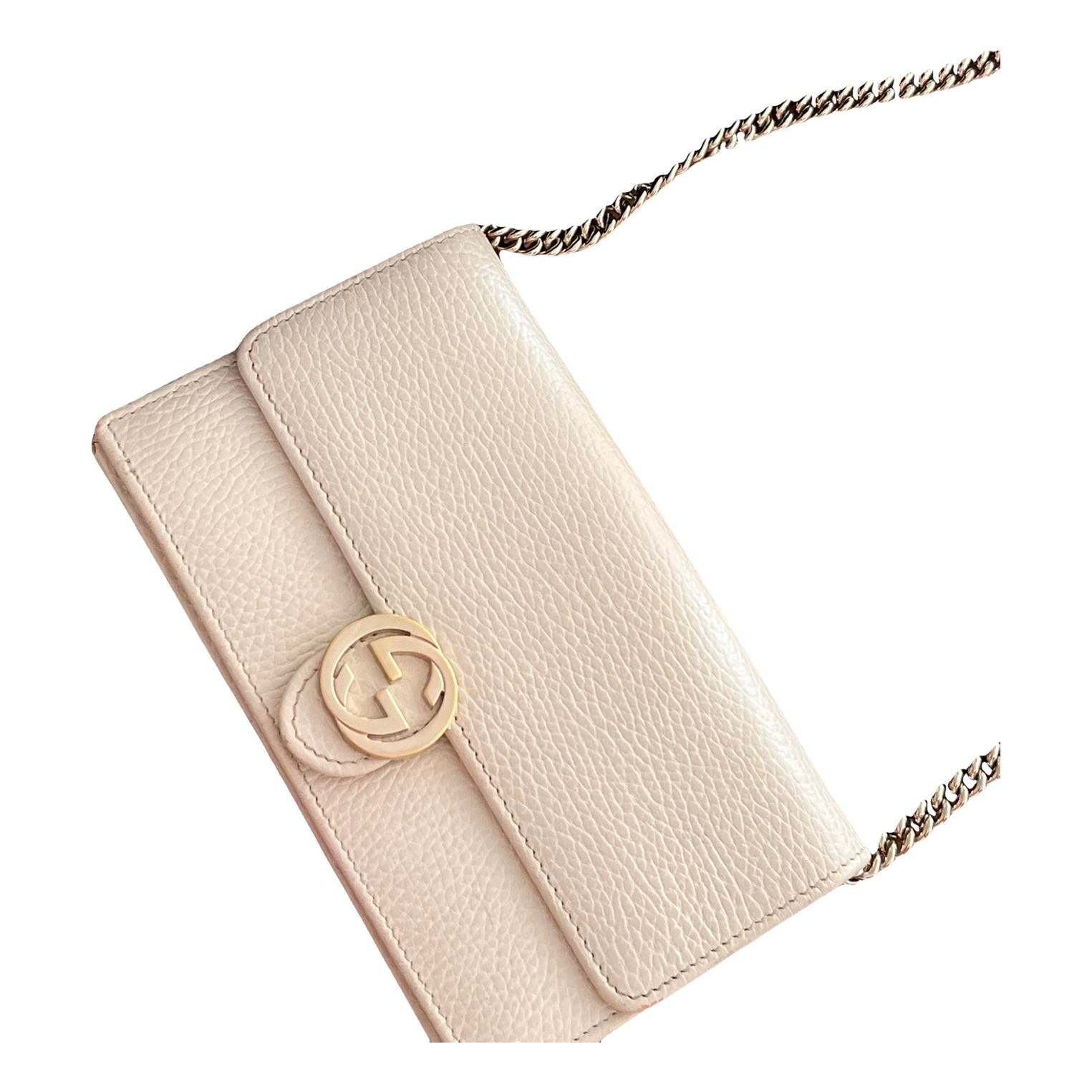 Interlocking leather clutch bag