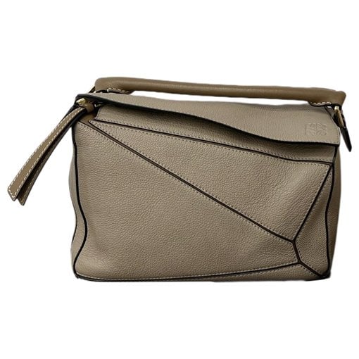 Puzzle leather handbag