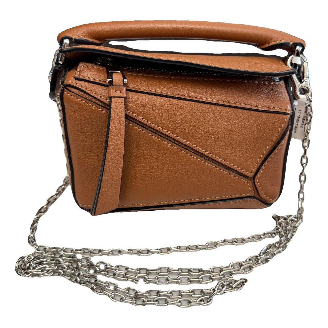 Puzzle leather handbag