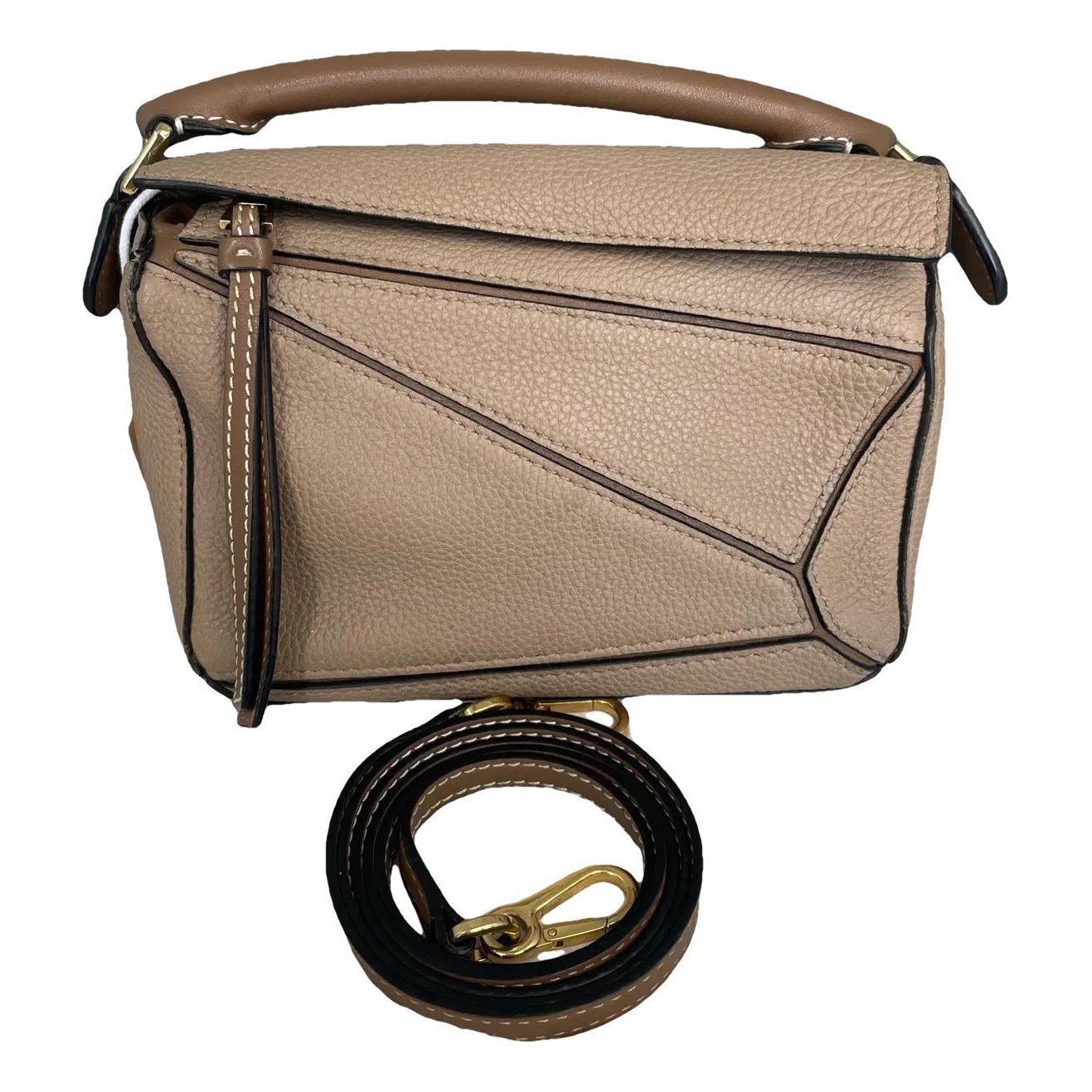 Puzzle leather handbag