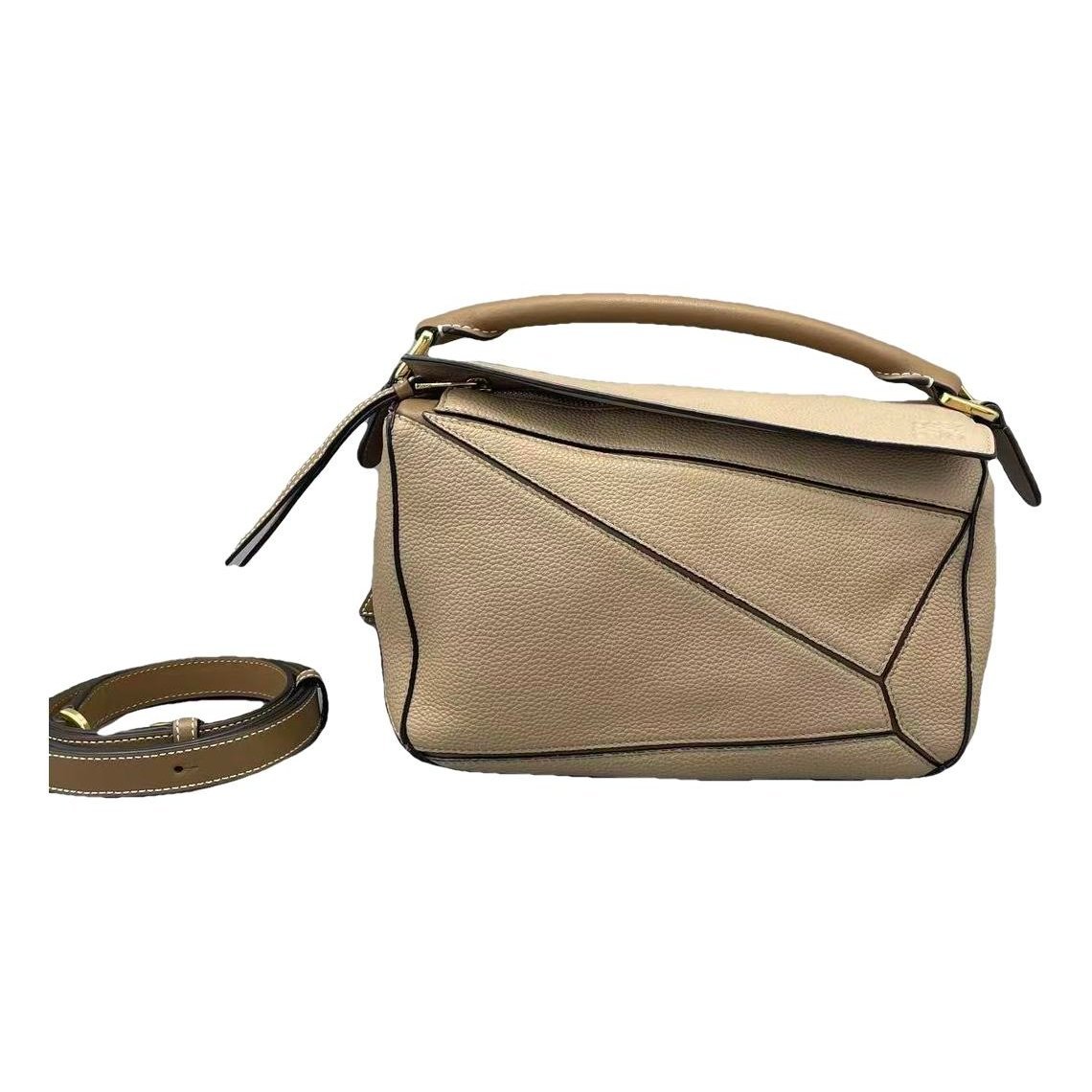 Puzzle leather handbag