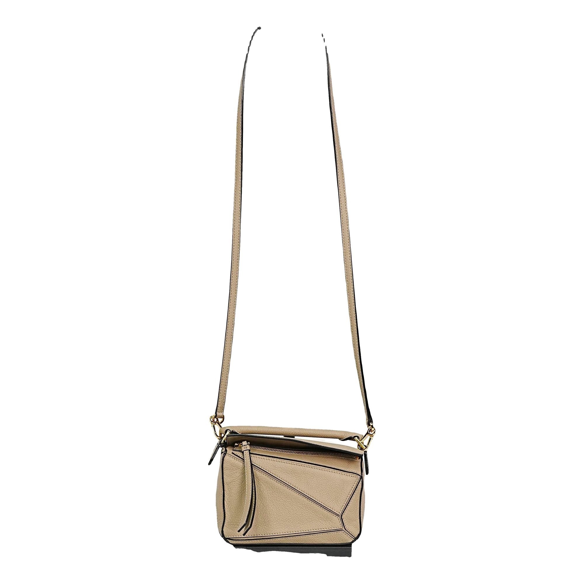 Puzzle leather handbag