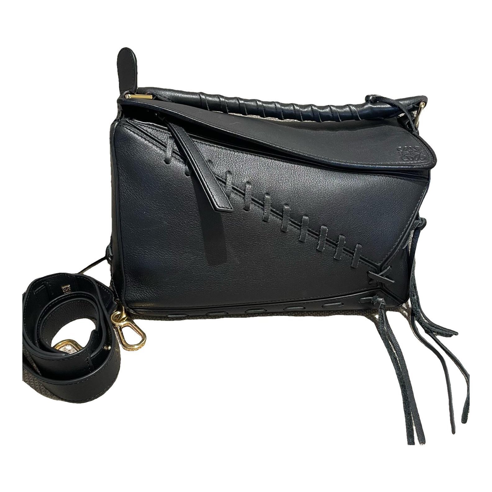 Puzzle leather handbag
