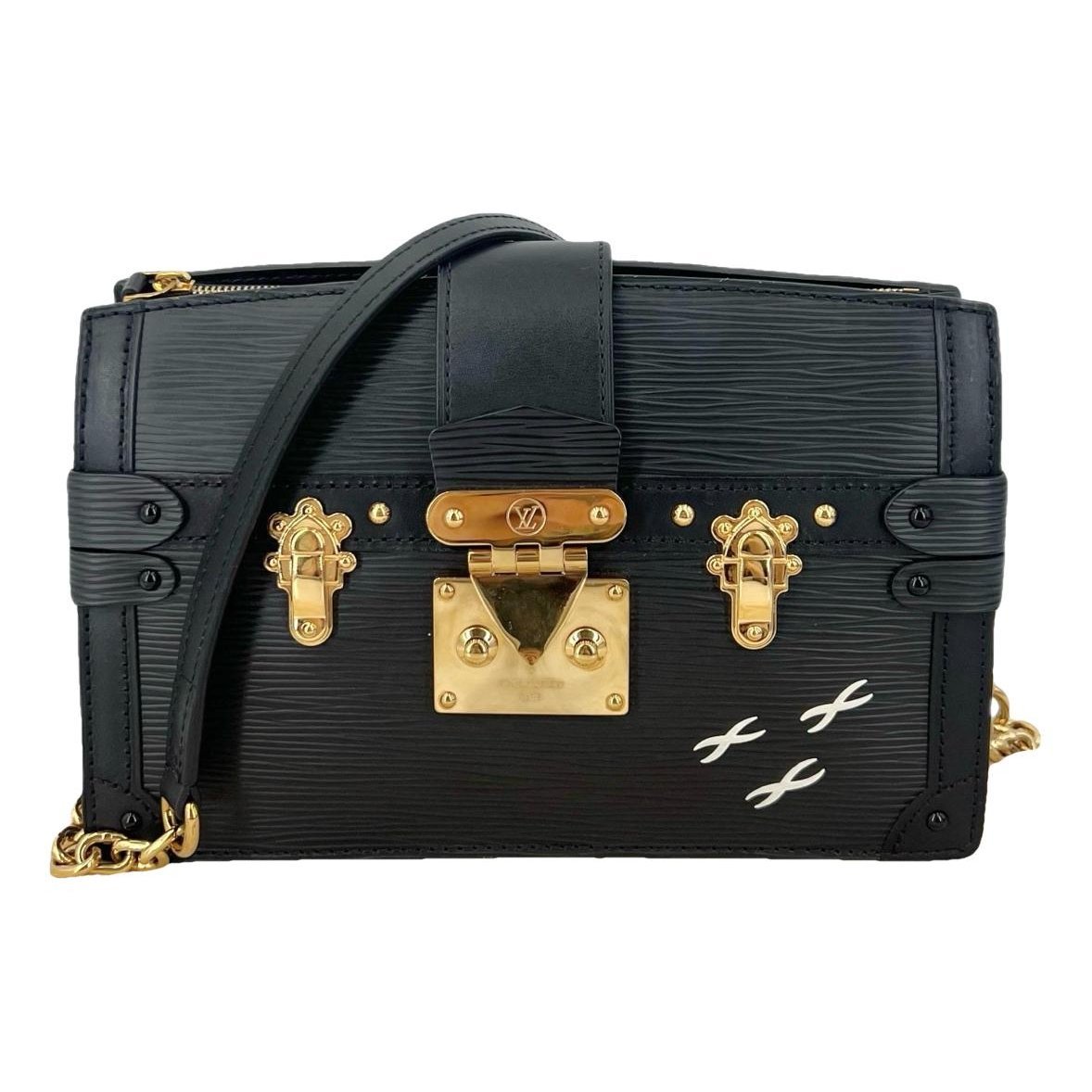 Pochette Trunk leather handbag