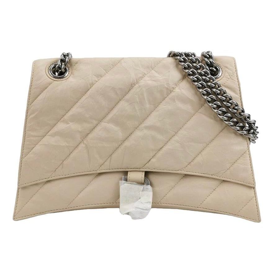 Hourglass leather handbag