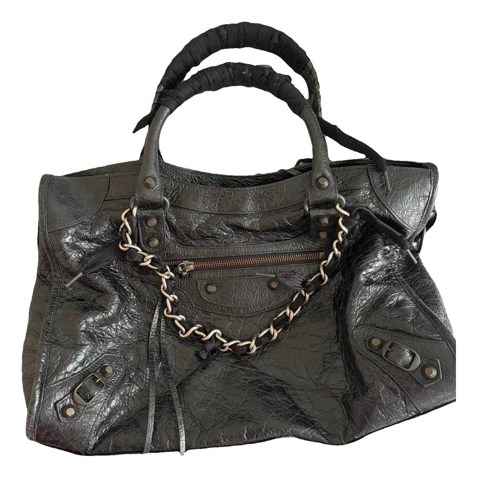 City patent leather handbag