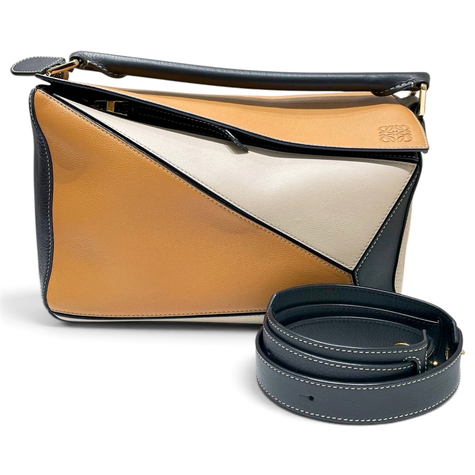 Puzzle leather handbag
