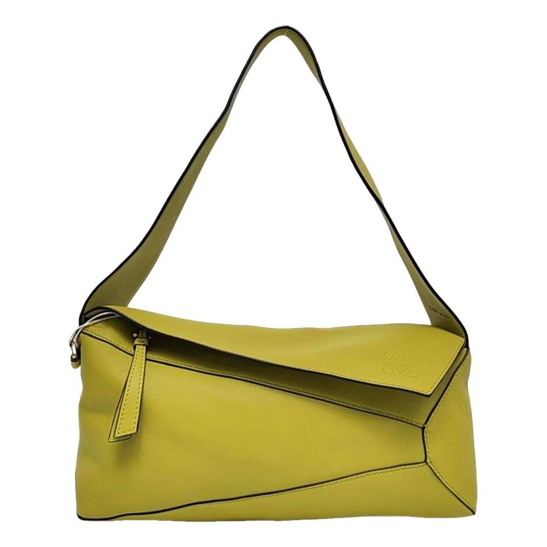 Puzzle leather handbag