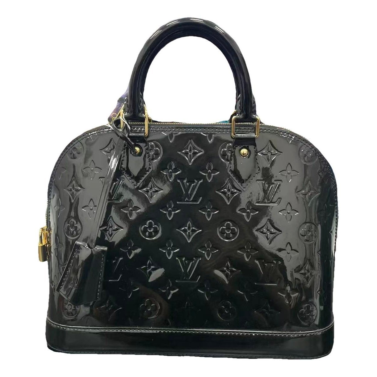 Louis Vuitton Alma patent leather handbag