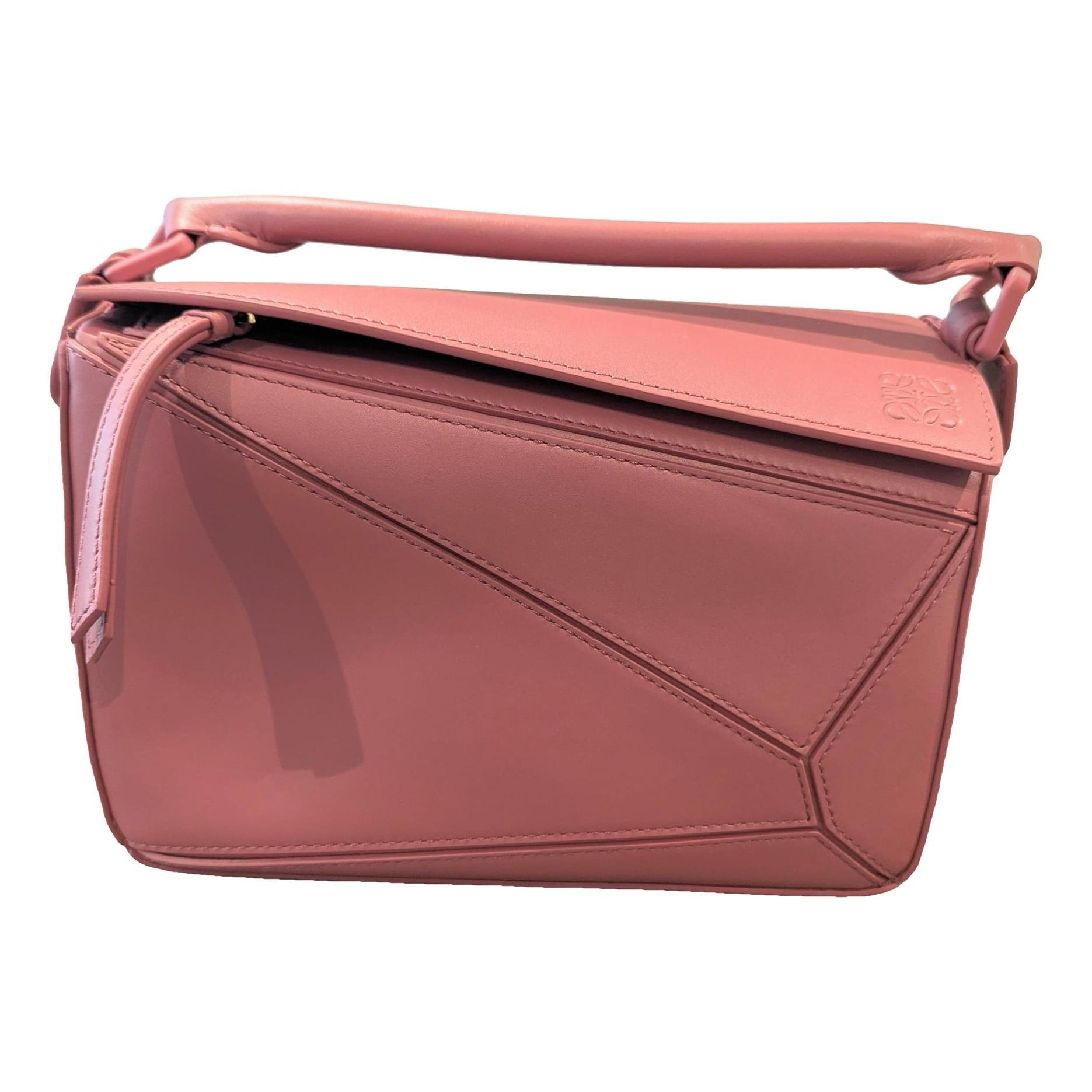 Puzzle leather handbag
