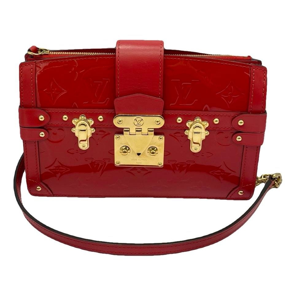 Pochette Trunk leather handbag