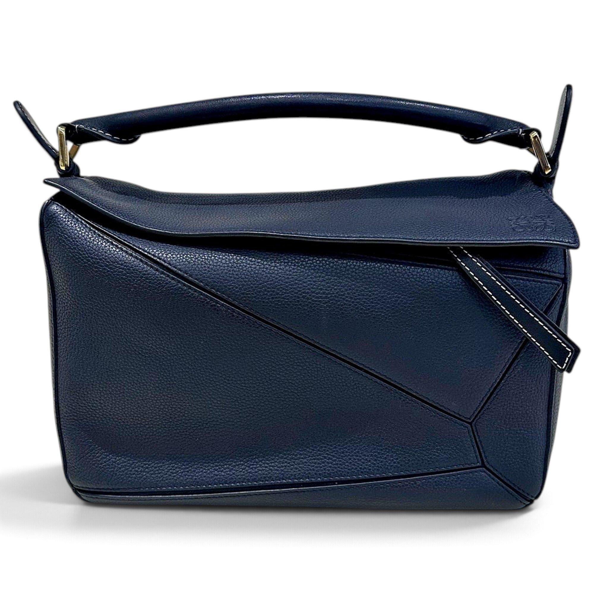Puzzle leather handbag
