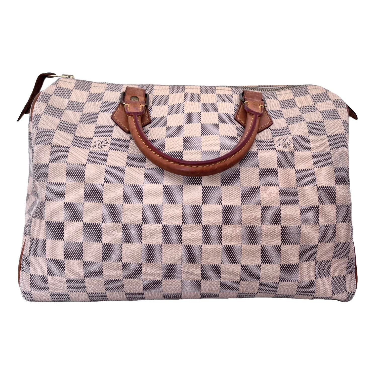Speedy patent leather handbag
