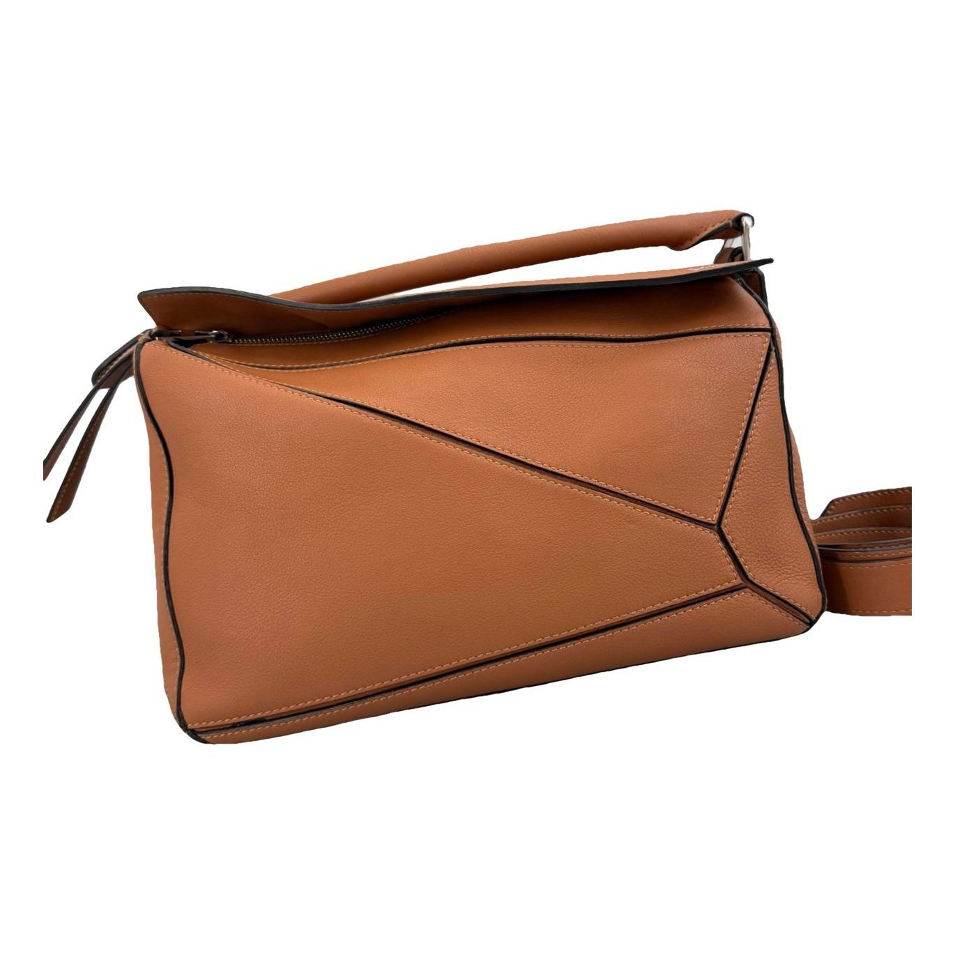 Puzzle leather handbag